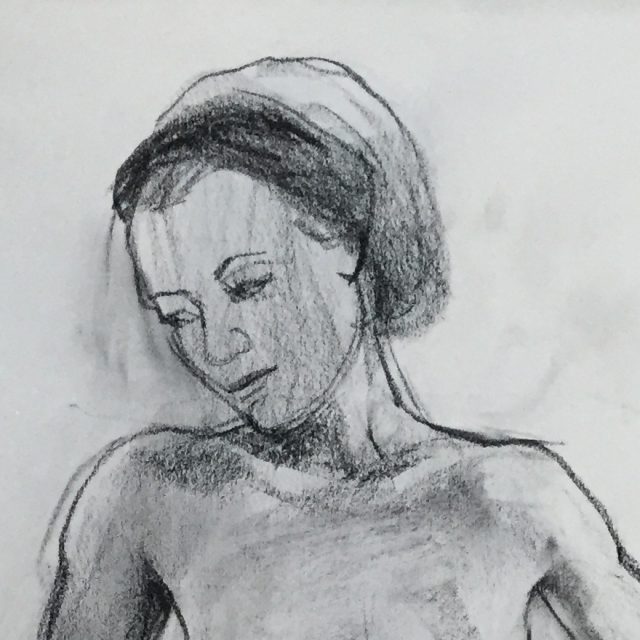 charcoal drawing of a woman wearing a head wrap