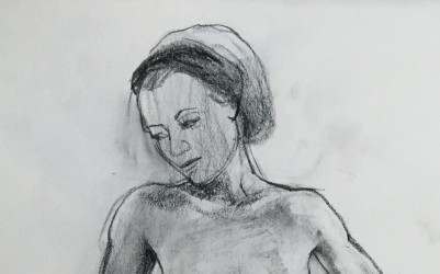 Charcoal on paper, 18"x24" charcoal drawing of a woman wearing a head wrap
